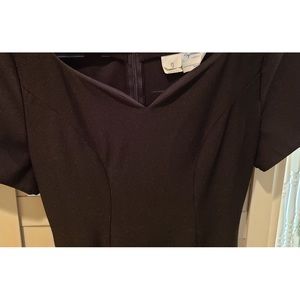 Southern well fitted long black gown with flowy skirt.  Sz 0.